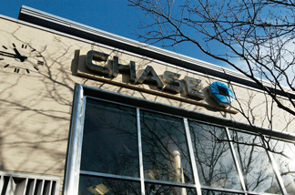 JPMorgan Chase admitted to overcharging more than 4,000 active-duty military personnel on their home loans and said it foreclosed in error on 14 of them. The company will send out $2 million worth of refunds to 4,000 active-duty customers who were affected.