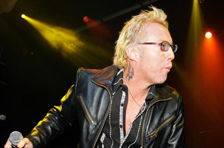 Warrant singer Jani Lane performs with Camp Freddy during the grand opening of the Empire Ballroom October 22, 2005 in Las Vegas, Nevada.