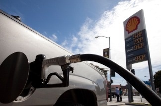 A sign showing the price for gasoline is displayed at a Shell gas station on April 27, 2011 in San Francisco, California.