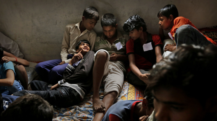 Child laborers wait to be processed at a safe house after being rescued during a raid at a factory in New Delhi by workers from Bachpan Bachao Andolan (Save the Childhood Movement) in June.