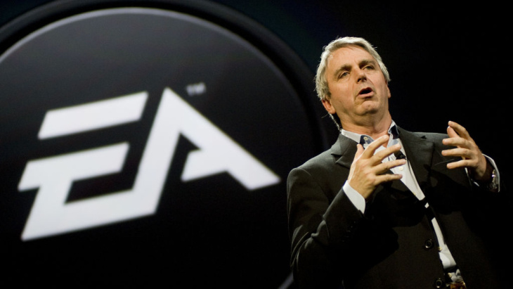 Electronic Arts CEO John Riccitiello, seen here speaking at the E3 Expo in 2010, is stepping down, the company announced Monday.