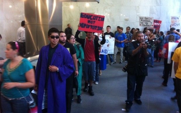 Undocumented students and their supporters protest in federal office building in Los Angeles, October 12, 2011