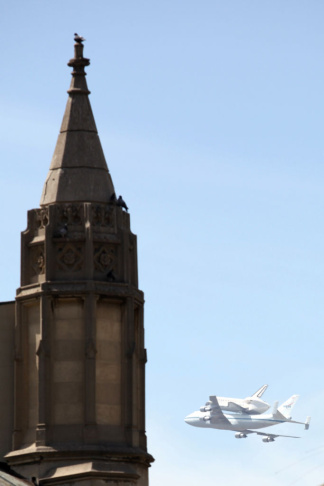 NASA Space Shuttle Endeavour flies past First Congregational Church of Los Angeles (FCCLA). 
