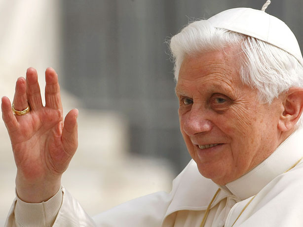 Pope Benedict XVI waves from the popemobile during his weekly general audience, in St. Peter's Square at the Vatican.