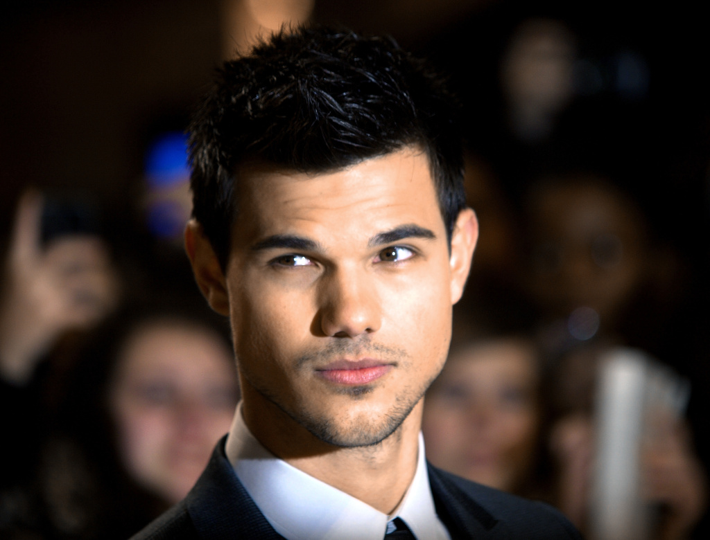 File: Taylor Lautner poses as he arrives for the premiere of 'Twilight: Breaking Dawn' in London's Stratford City on Nov. 16, 2011.