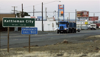 California Highway 41 is the main street of Kettleman City, Calif., seen Tuesday, Dec. 8, 2009. The tiny farm town is home to the largest toxic waste dump in the West. Chemical Waste Management, which wants to increase the size of one part of the dump and build another section. Pointing to an unusually high number of birth defects and infant deaths recently, area activists are asking Kings County to reject the expansion of the 1,600-acre facility.