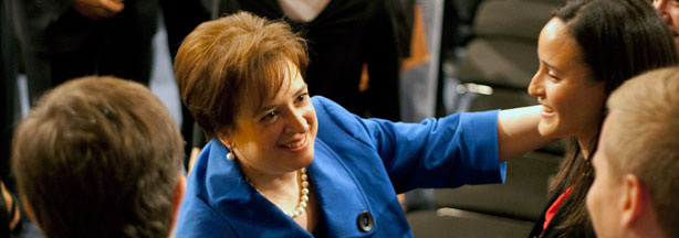 Elena Kagan shaking hands with her family, friends, students and colleagues.