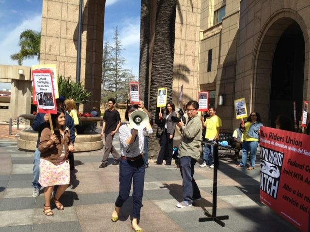 Protesters from the Bus Riders Union hold signs and bullhorns outside Metropolitan Transit Authority Headquarters in downtown Los Angeles.