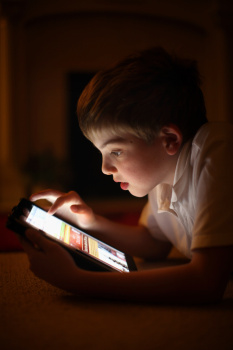 Children Interacting With Tablet Technology