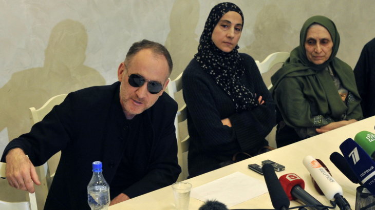 Zubeidat Tsarnaeva, center, mother of Boston Marathon bombing suspects Tamerlan and Dzhokhar, reportedly spoke of radical ideas with her eldest son in 2011. Anzor Tsarnaeva, the boys' father, is on the left. At right is the boys' aunt, Patimat Suleymanova