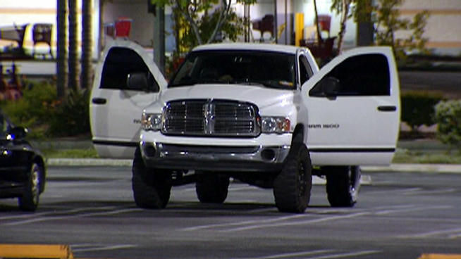 The white Ram pickup driven by two Marines contained non-lethal grenades