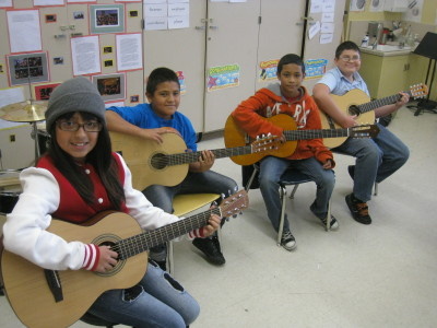 A teacher is able to supply guitars to his students thanks to gift card donations as part of a partnership between LAUSD and the Wasserman Foundation (using the online nonprofit DonorsChoose.org).