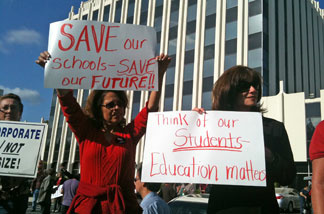 Public school educators from north Orange County protest to preserve education funding in front of the Fullerton offices of Republican state Assemblyman Chris Norby. Orange County, home to a strong anti-tax contingent, will also have its schools face millions in cuts should Prop. 30 not pass Tuesday.