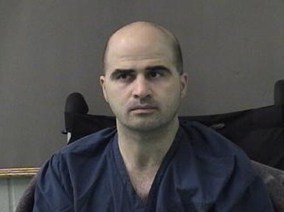 In this photo released by the Bell County Sheriff's Office, U.S. Maj. Nidal Hasan is seen in a booking photo after being moved to the Bell County Jail on April 9, 2010 in Belton, Texas.