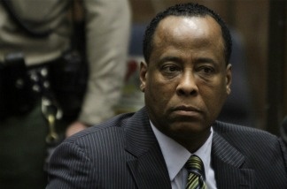 Dr. Conrad Murray sits in court at his arraignment at Superior Court in Los Angeles, California.