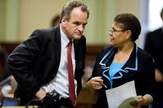California State Assembly Republican leader Sam Blakeslee (R-San Luis Obispo) and Speaker Karen Bass (D-Los Angeles) work to finalize a solution to the state's budget problem on July 24, 2009 in Sacramento. Bass now heads to the nation's capital as one of California's two new members to Congress. The other is Republican Jeff Denham from Fresno.