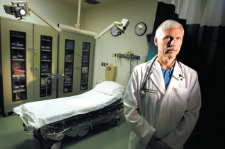 Dr. Larry Foreman treats injured ATV riders at the Arroyo Grande Community Hospital.