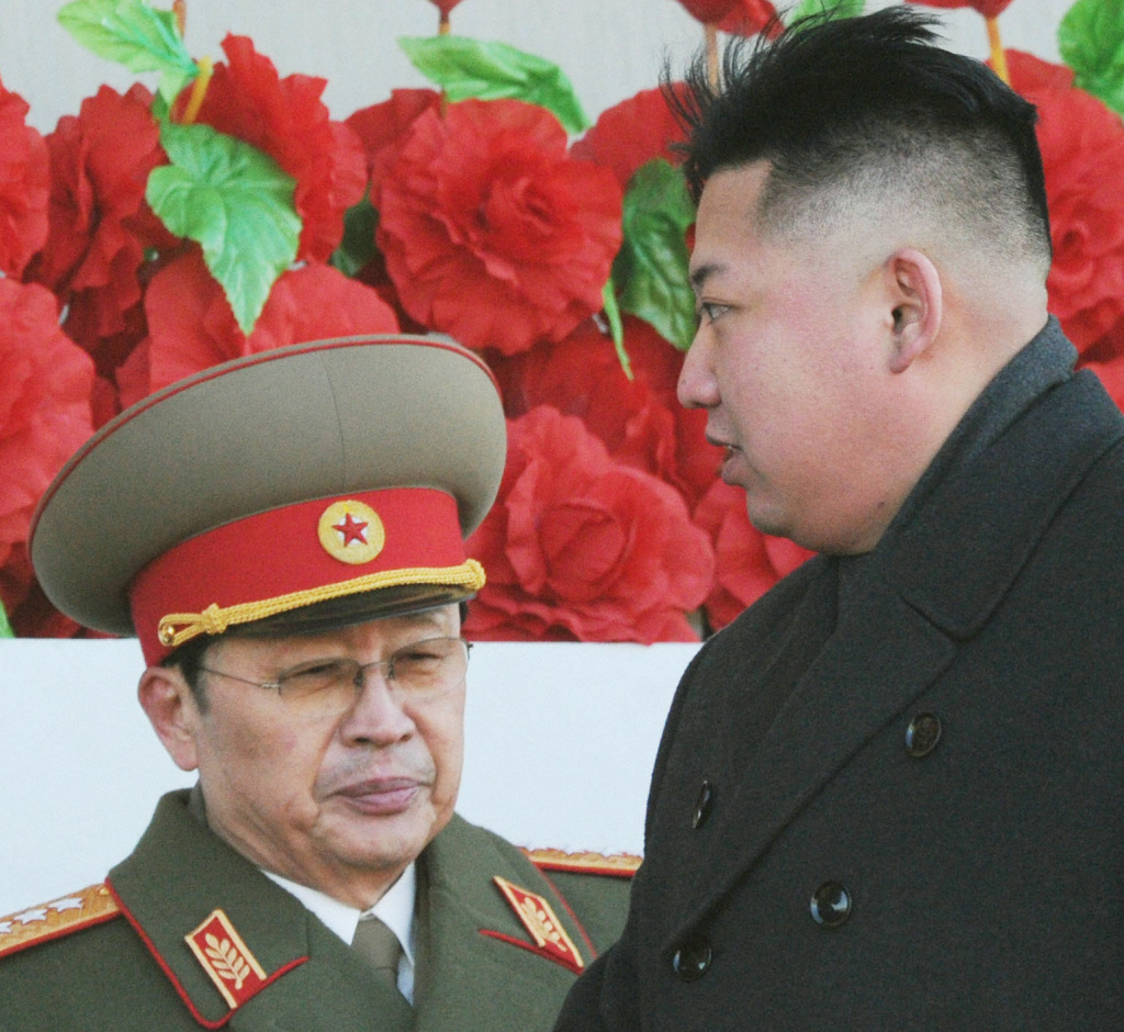 Before their split: North Korean leader Kim Jong Un, right, and his uncle, Jang Song Thaek, in February 2012. Earlier this month, Jang was executed.