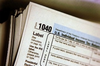 File photo: A new report from the Public Policy Institute of California says the Earned Income Tax Credit can help families stay out of poverty.