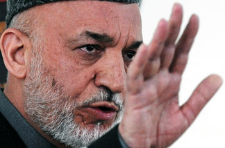 Afghan President Hamid Karzai at the Independent Electoral Commission compound in Kabul on April 1, 2010.