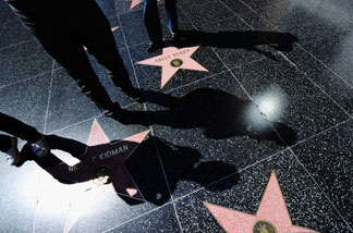 Shadows of tourist are cast on the Hollywood Walk of Fame on September 27, 2010 in Los Angeles, California. The heat wave continues to bring hot temperatures to the Southland.