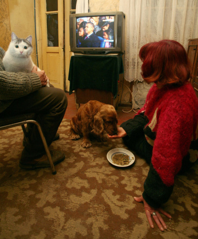 A Georgian family and their pets watch t