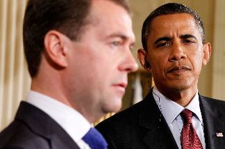 President Barack Obama (R) and Russian President Dmitry Medvedev participate in a news conference June 24, 2010 at the East Room of the White House in Washington, DC.