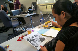A teacher studies a map of the Middle East.