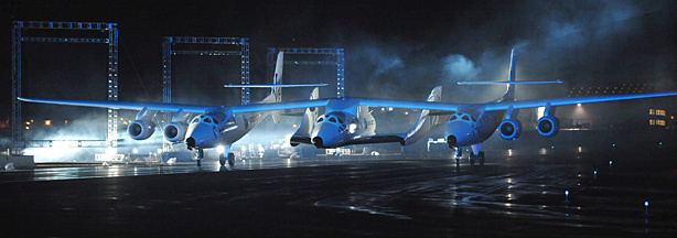 Virgin Galactic's SpaceShipTwo, the world's first commercial spacecraft for tourists, arrives slung under launch ship White Knight Two as it is unveiled at it's world debut, at the Mojave Air and Space Port in Mojave, California on December 7, 2009.