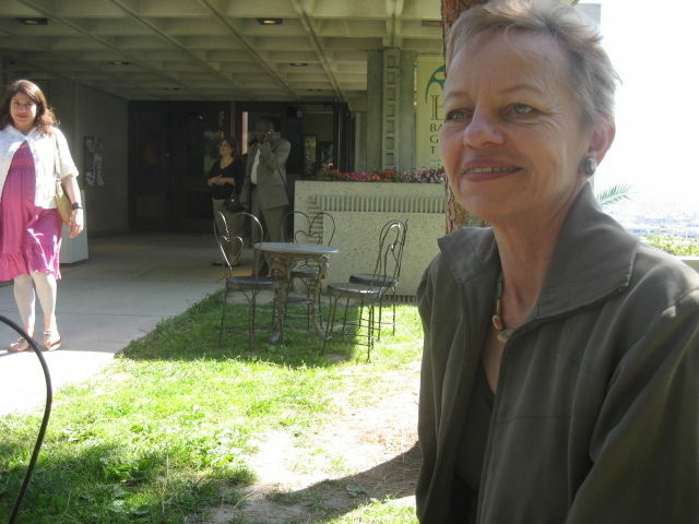 Nanci Rossov said she's likely to be laid off as the Watts Towers Art Center is set to close as a cost-cutting measure. She attended a Department of Cultural Affairs meeting at which layoffs and other cuts were announced.