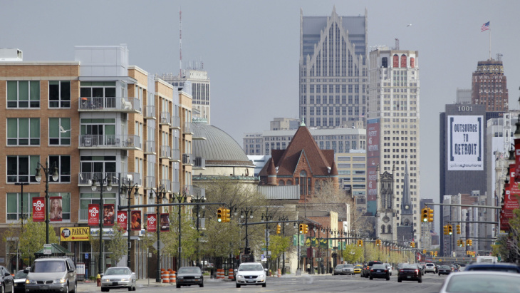 Woodward Avenue runs through Midtown, a Detroit neighborhood that is reviving in the midst of the larger city's decline. In the background is downtown Detroit.