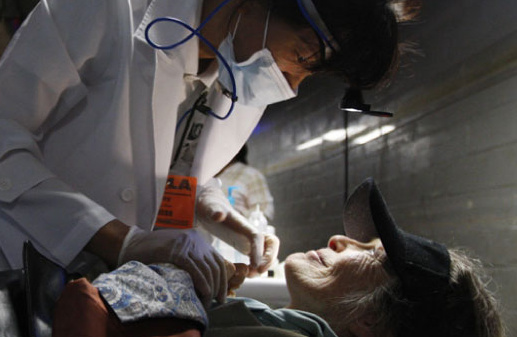 A screen shot of a caregiver at a CareNowLA event, coming to the L.A. sports arena October 20-23, 2011.