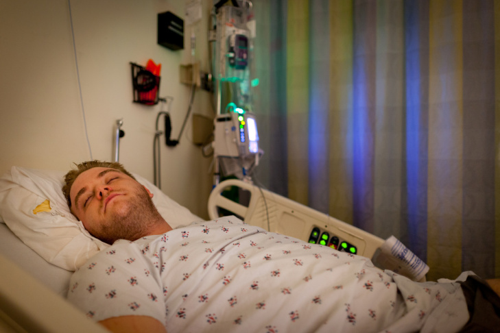 Man in hospital bed