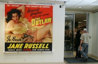 An original poster from the 1943 movie 'The Outlaw' staring Jane Russell is one display at Bonhams & Butterfields auction house in Los Angeles on Dec. 14, 2006, during the preview of their upcoming Entertainment Memorabilia Auction.