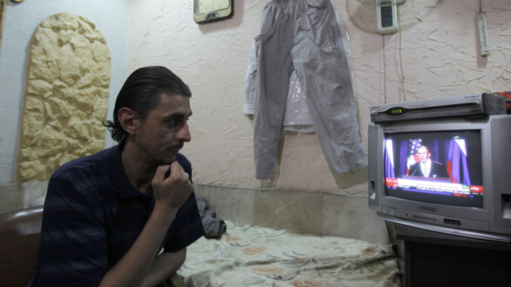 The Syrian regime calls a new deal on its chemical weapons a victory, in a reaction that came one day after the U.S. and Russia announced the plan. On Saturday, live coverage of the the deal drew the attention of a Damascus flower shop owner.
