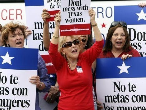 Protesters in San Antonio argue against efforts to cut Planned Parenthood from Texas' Women's Health Program in March.