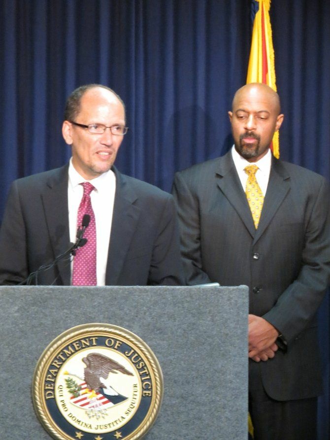 Assistant Attorney General for Civil Rights Thomas E. Perez with Deputy Assistant Attorney General Roy Austin in Phoenix on Thursday.