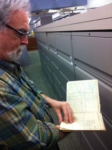 Glen Creason reads a map
