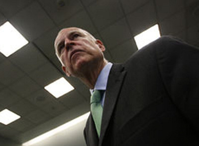 California Attorney General and gubernatorial candidate Jerry Brown arrives to a press conference to announce that he is filing a motion to compel bond-rating firm Moody's Investors Service to comply with a subpoena it has resisted for seven motions on April 19, 2010 in Los Angeles.