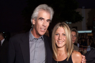 Exec. Prod. Steve Reuther and Jennifer Aniston at the premiere of 'Rock Star' at the Mann Village Theater in Los Angeles, Ca. 9/4/01.