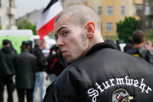 A skinhead takes part in a right-wing rally