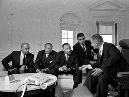 Martin Luther King, Jr. (center), with Roy Wilkins, James Farmer, and Whitney Young, met with President Lyndon B. Johnson in the Oval Office on Jan. 18, 1964.