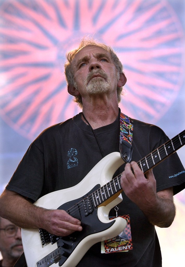 In this June 5, 2004 file photo, singer-songwriter J.J. Cale plays during the Eric Clapton Crossroads Guitar Festival in Dallas, Texas. Cale, whose best-known songs became hits for Eric Clapton with "After Midnight" and Lynyrd Skynyrd with "Call Me the Breeze," has died. He was 74.