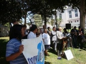 Protesters at a rally last year after the police shooting of day laborer Manuel Jamines, September 10, 2010