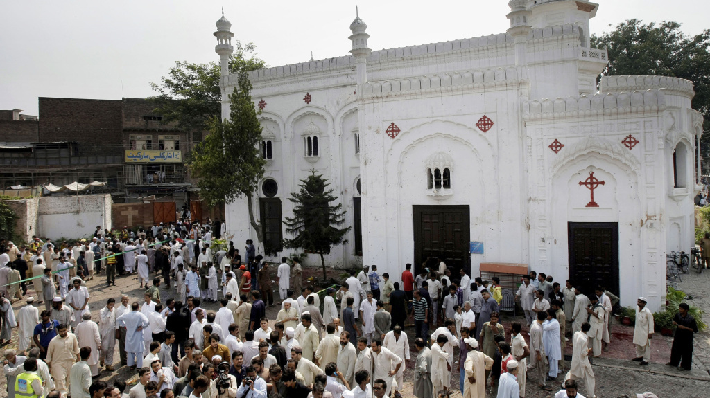 People gather outside All Saints Church in Peshawar, Pakistan, Sunday, after a suicide bombing attack killed scores of people earlier in the day, officials said. People gather outside All Saints Church in Peshawar, Pakistan, in 2013 after a suicide bombing attack killed scores of people earlier in the day, officials said. This Sunday another suicide bombing hit a popular park in Lahore.