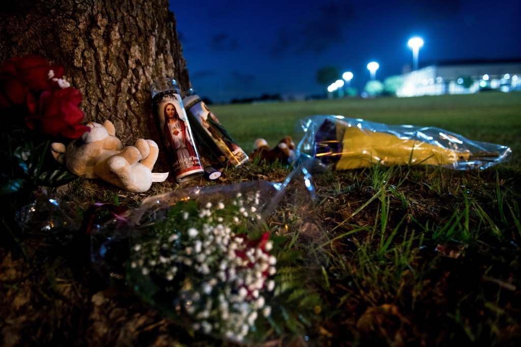 US-CRIME-TEXAS-SCHOOL-SHOOTING A makeshift memorial is seen outside Santa Fe High School a day after a mass shooting May 19, 2018 in Santa Fe, Texas.