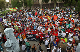 Protesters from California join Arizonans at the state capitol building for a demonstration against Arizona's immigration enforcement law SB 1070 on July 29, 2010 in Phoenix, Ariz.