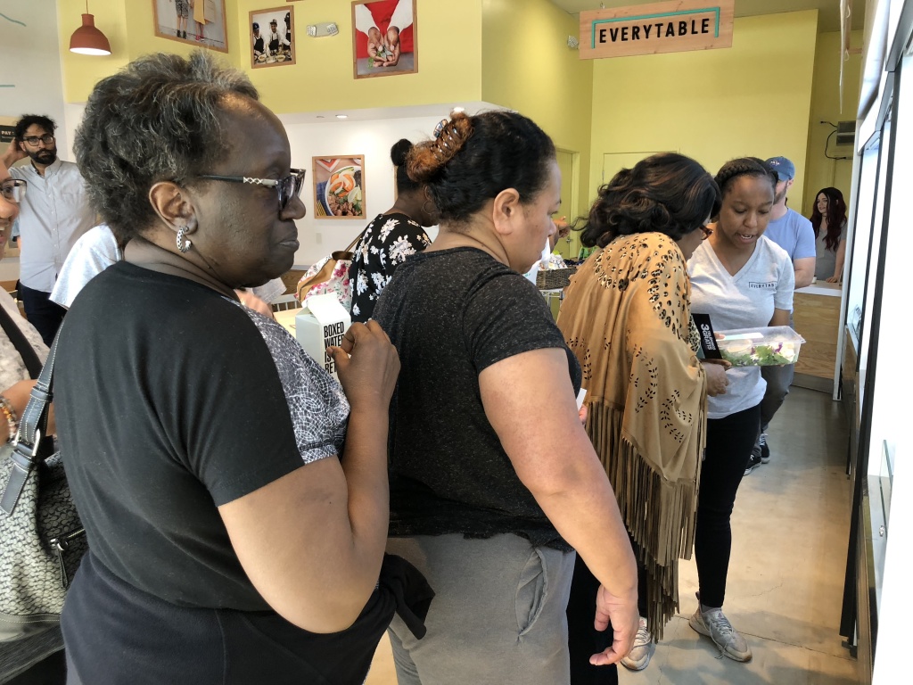 Everytable's first Compton customers line up and pick their cheap meal from the restaurant's grab-and-go fridges. Everytable's first Compton customers line up and pick their cheap meal from the restaurant's grab-and-go fridges.