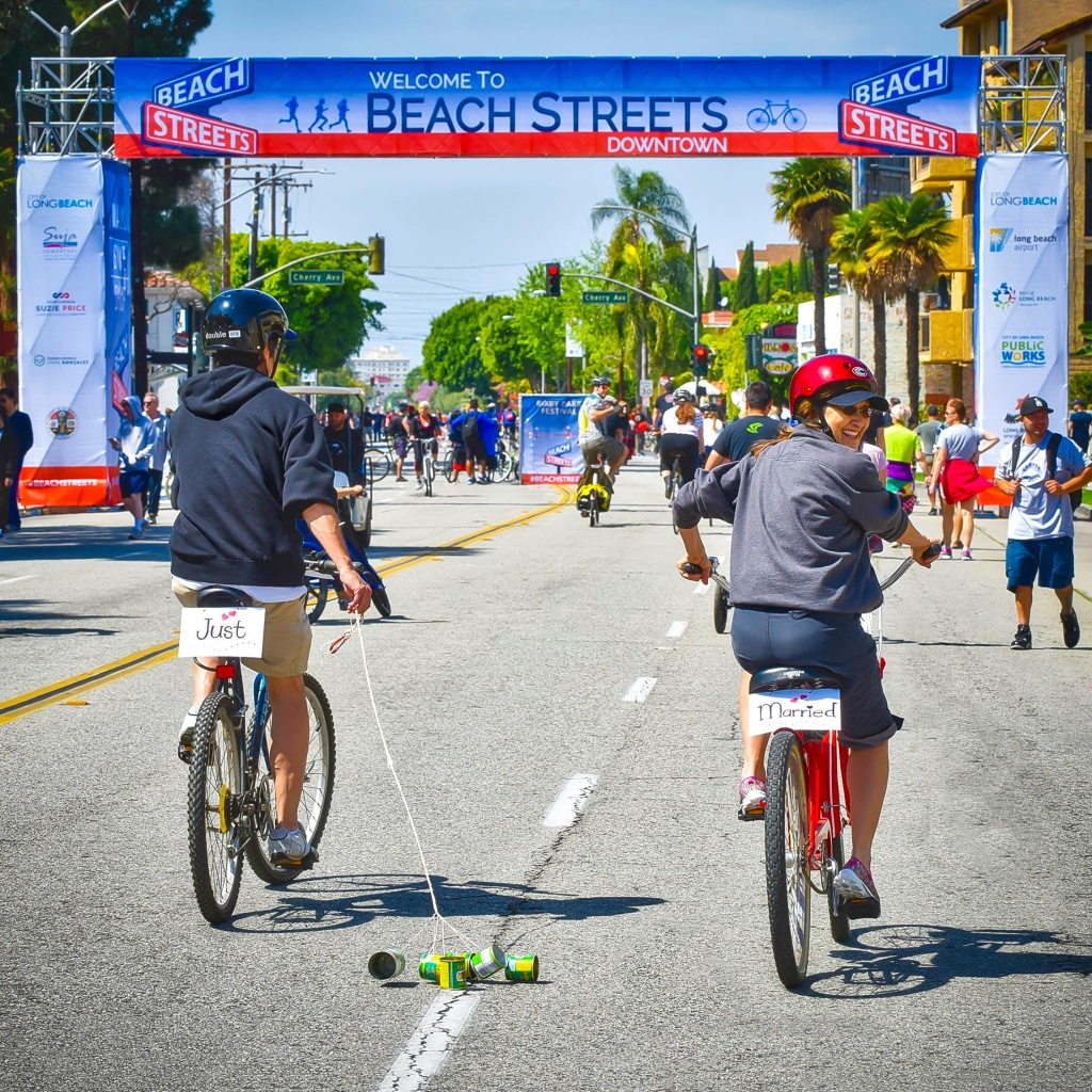bicyclists long beach bicycle Newly married bicyclists pedal through Long Beach during a Beach Streets event.
