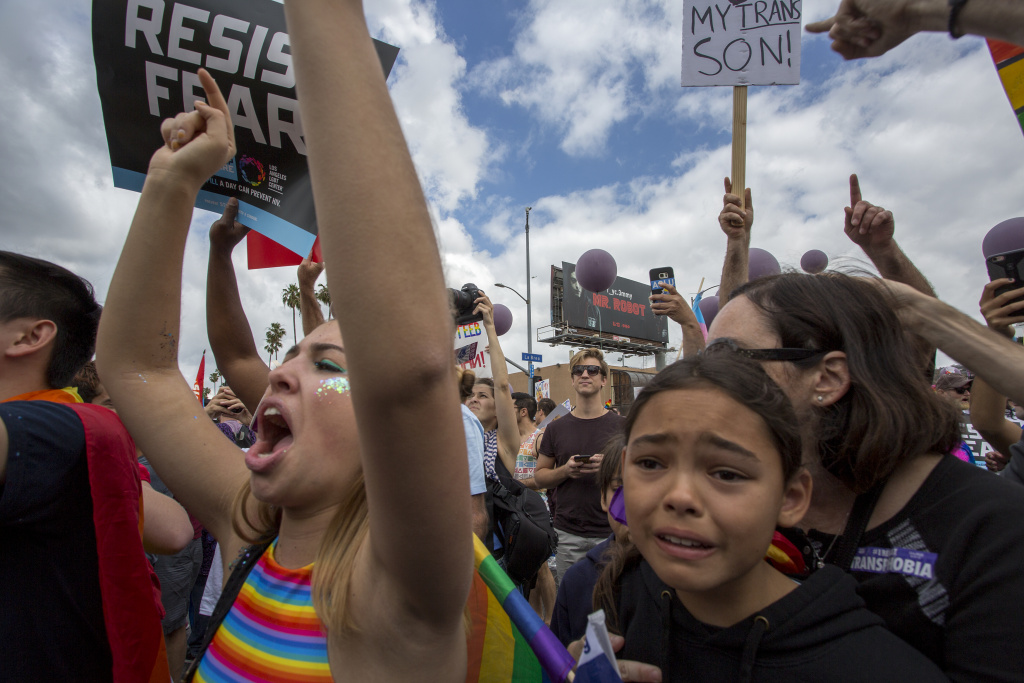 L.A. Pride Cancels Annual Parade In Favor Of Protest March LOS ANGELES, CA - JUNE 11: Marchers react to hateful speech from provocative street preachers at the #ResistMarch during the 47th annual LA Pride Festival on June 11, 2017 in the Hollywood section of Los Angeles and West Hollywood, California. Inspired by the huge women's marches that took place around the world following the inauguration of President Donald Trump and by the early pride demonstrations of the 1970s, LA Pride replaced its decades-old parade with the #ResistMarch protest to promote human rights by marching from Hollywood to West Hollywood. (Photo by David McNew/Getty Images)